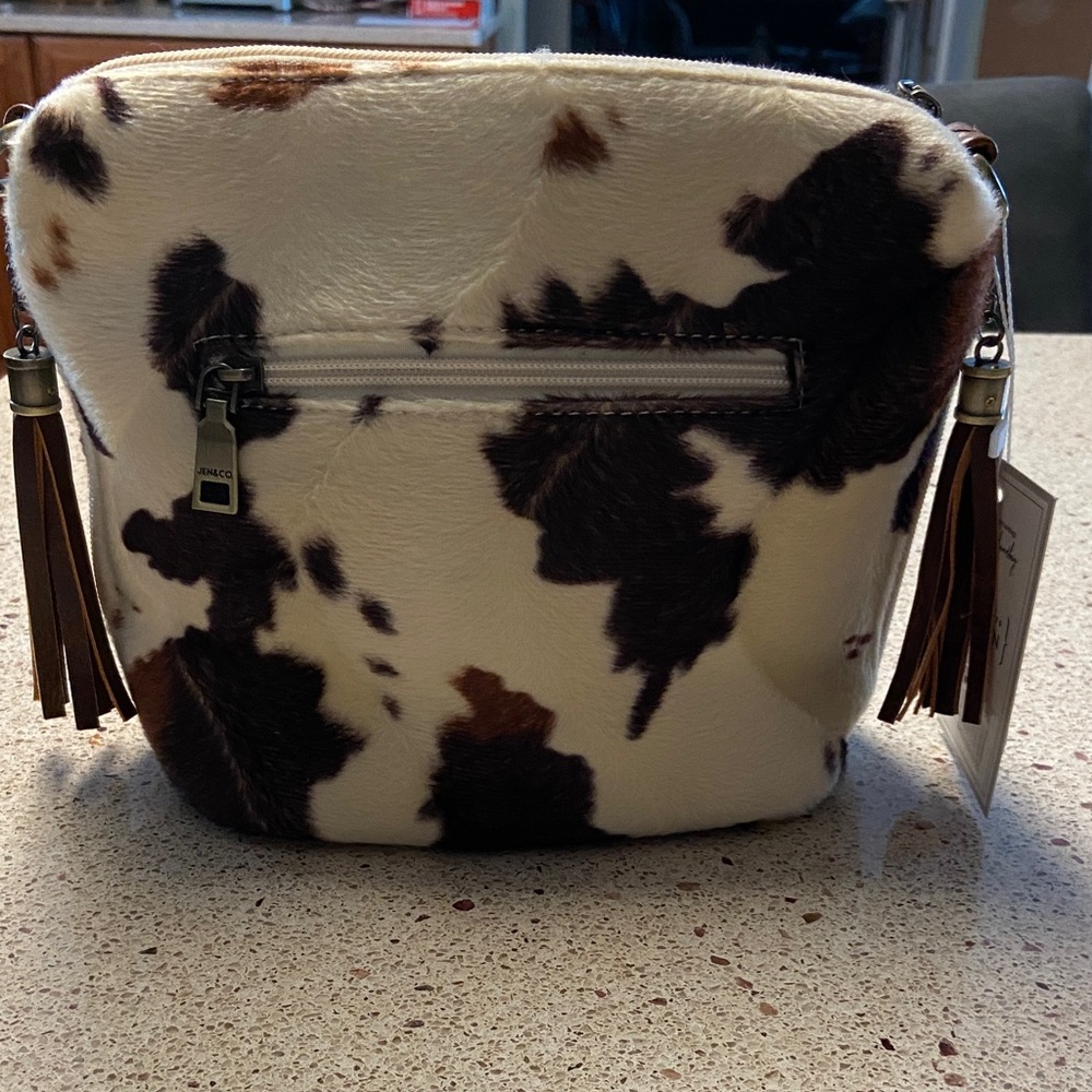 Stylish Cowhide Crossbody Bag with Tassels